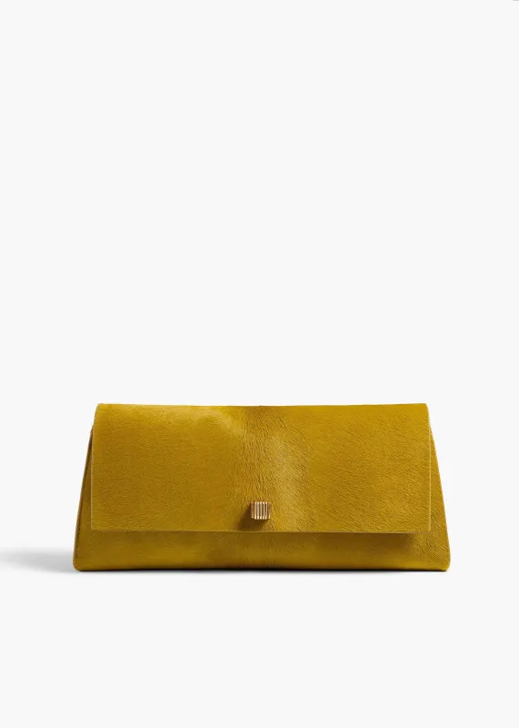 Audrey Clutch in Golden Olive Haircalf made by KHAITE