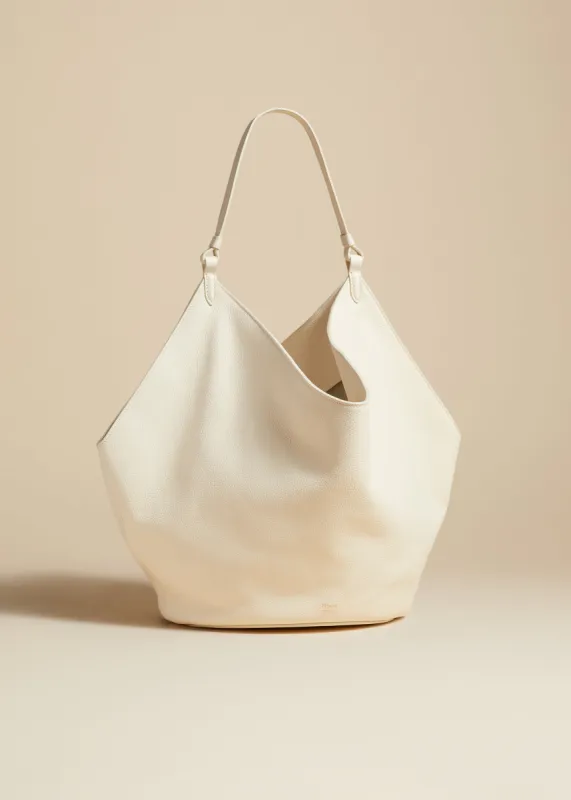The Medium Lotus Tote in Off-White Pebbled Leather sold by KHAITE