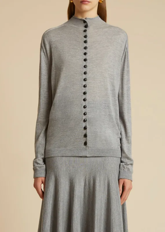 The Danika Sweater in Heather Grey sold by KHAITE