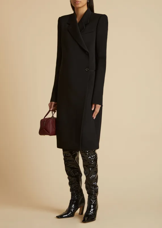 The Kento Coat in Black sold by KHAITE