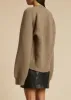The Emili Cardigan in Barley sold by KHAITE