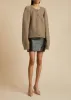 The Emili Cardigan in Barley sold by KHAITE