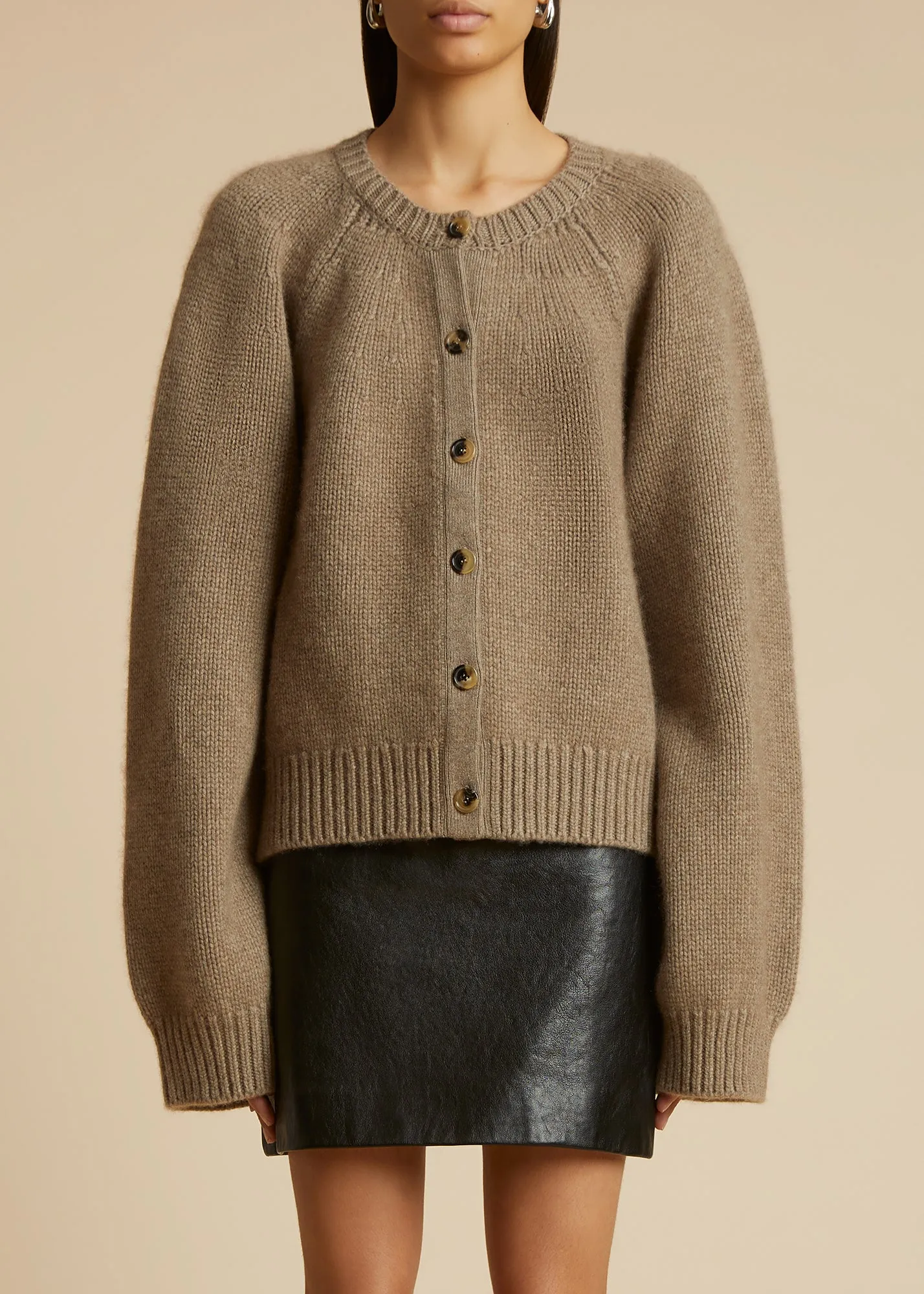 The Emili Cardigan in Barley sold by KHAITE