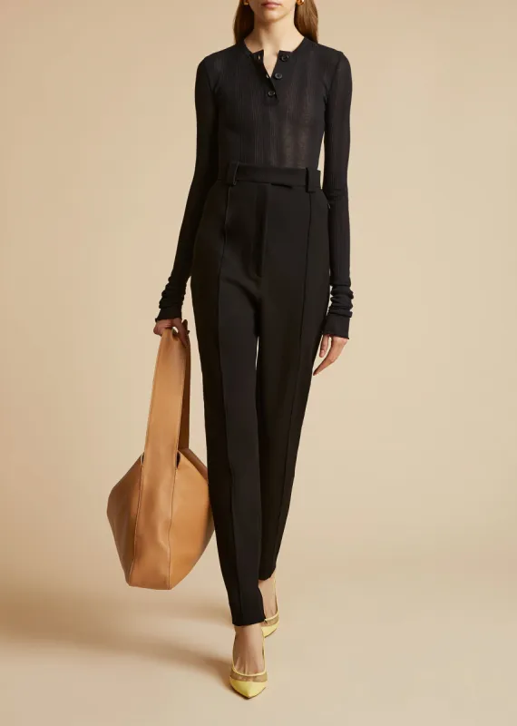 The Janelle Bodysuit in Black sold by KHAITE