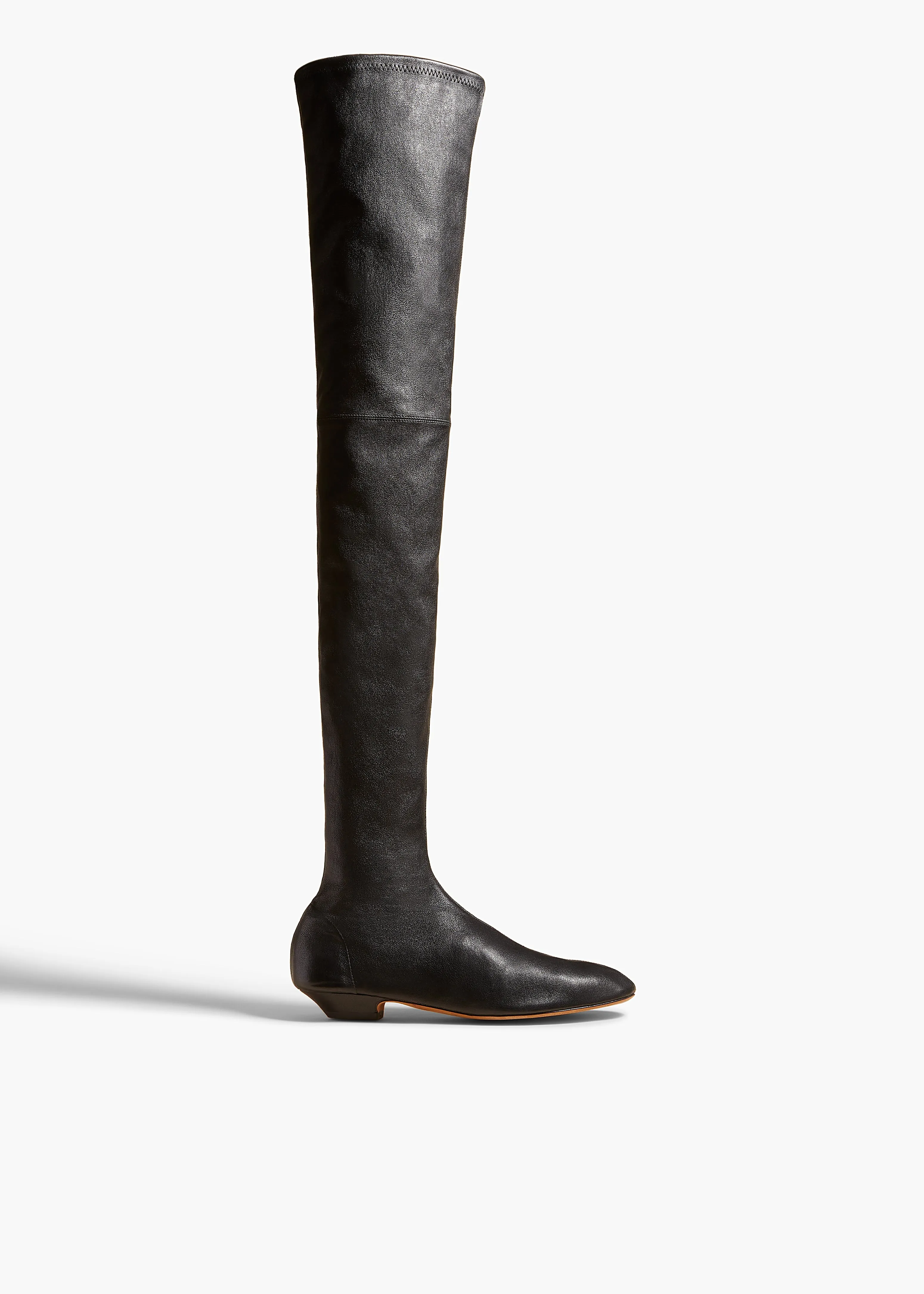 Apollo Over-the-Knee Flat Boot in Black Leather sold by KHAITE