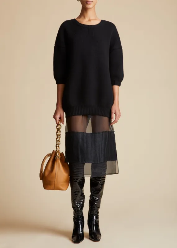 The Alleta Skirt in Black sold by KHAITE