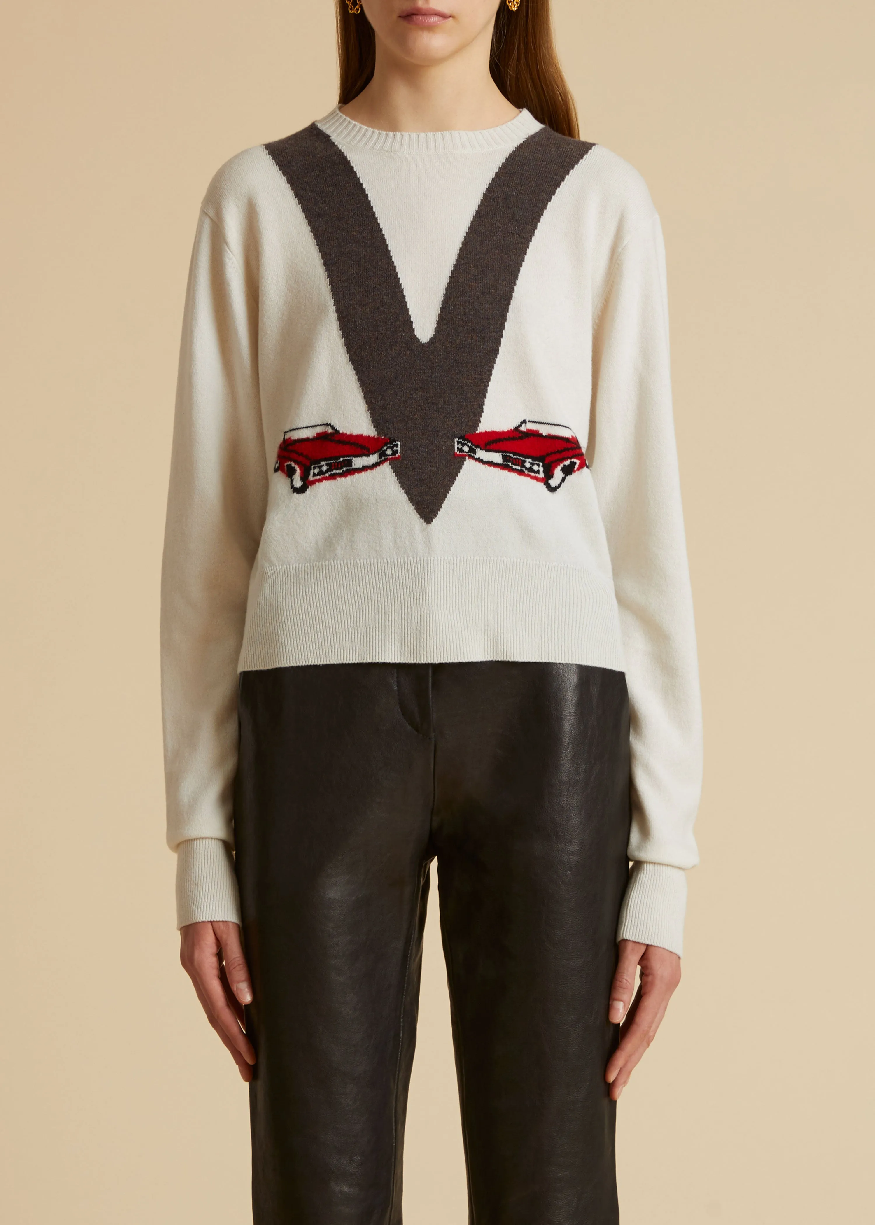 The Mavis Sweater in Ivory with Car Print sold by KHAITE