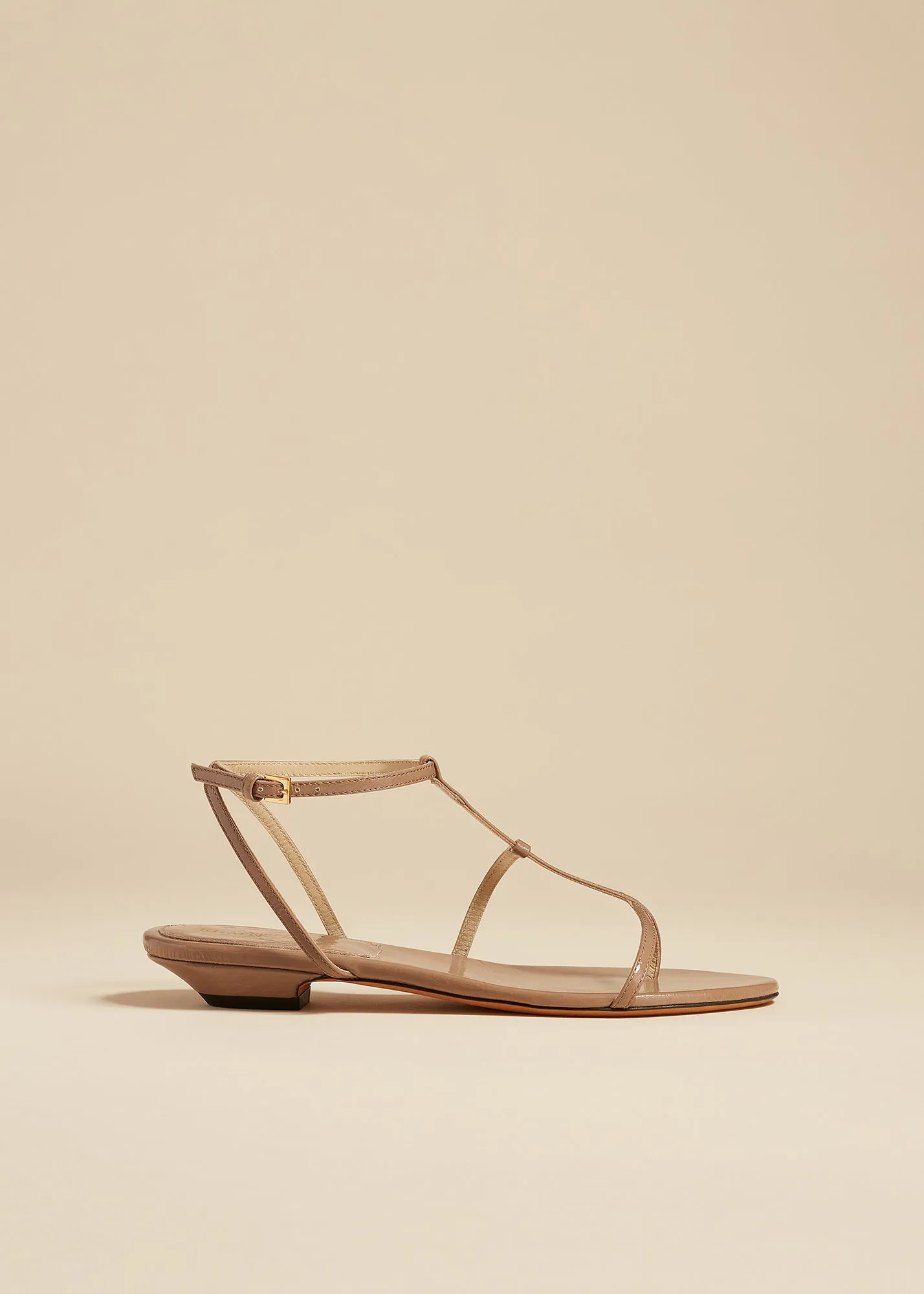 Jones Flat Sandal in Mud Crinkled Leather sold by KHAITE
