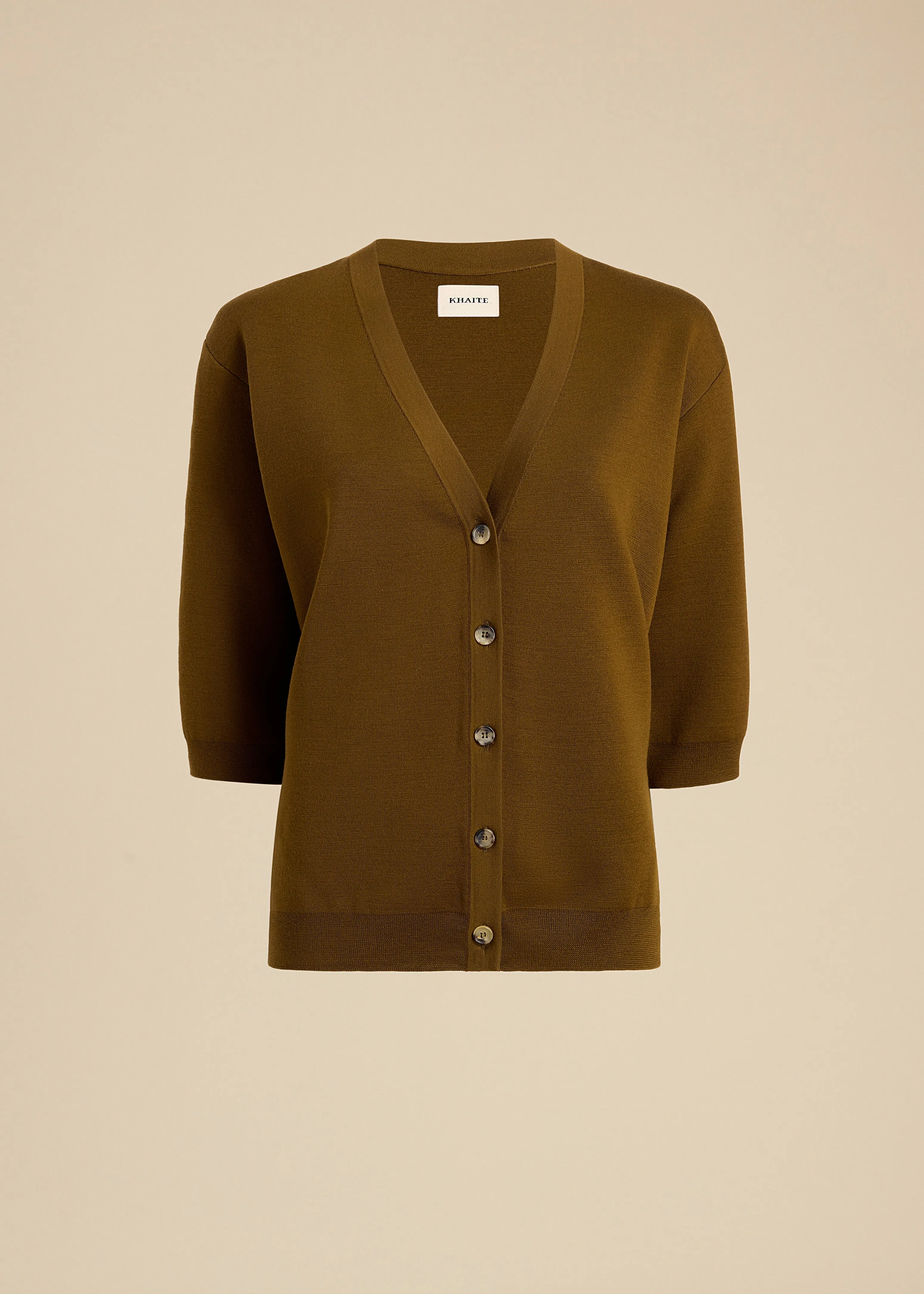 Tedi Cardigan in Dark Olive sold by KHAITE