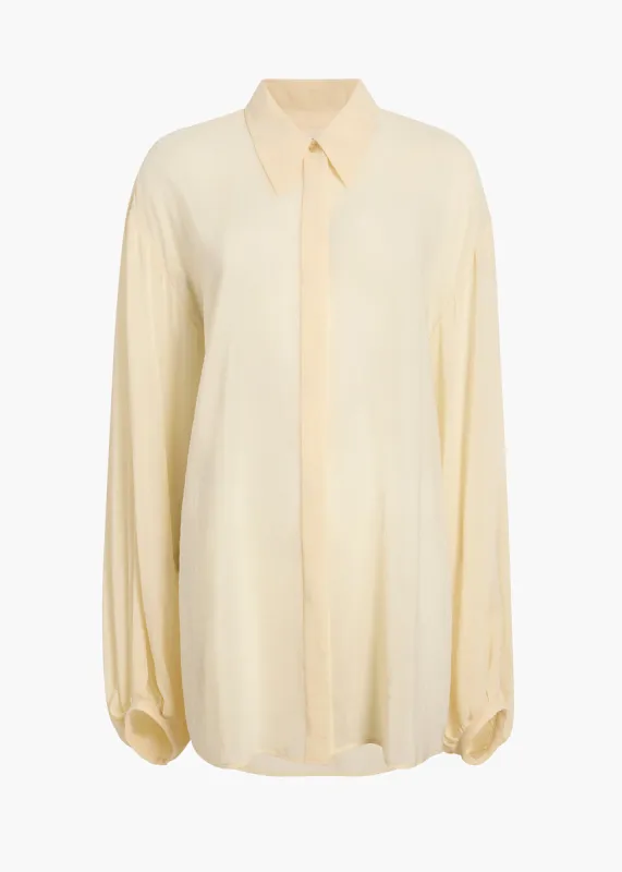 Bam Top in Cream sold by KHAITE
