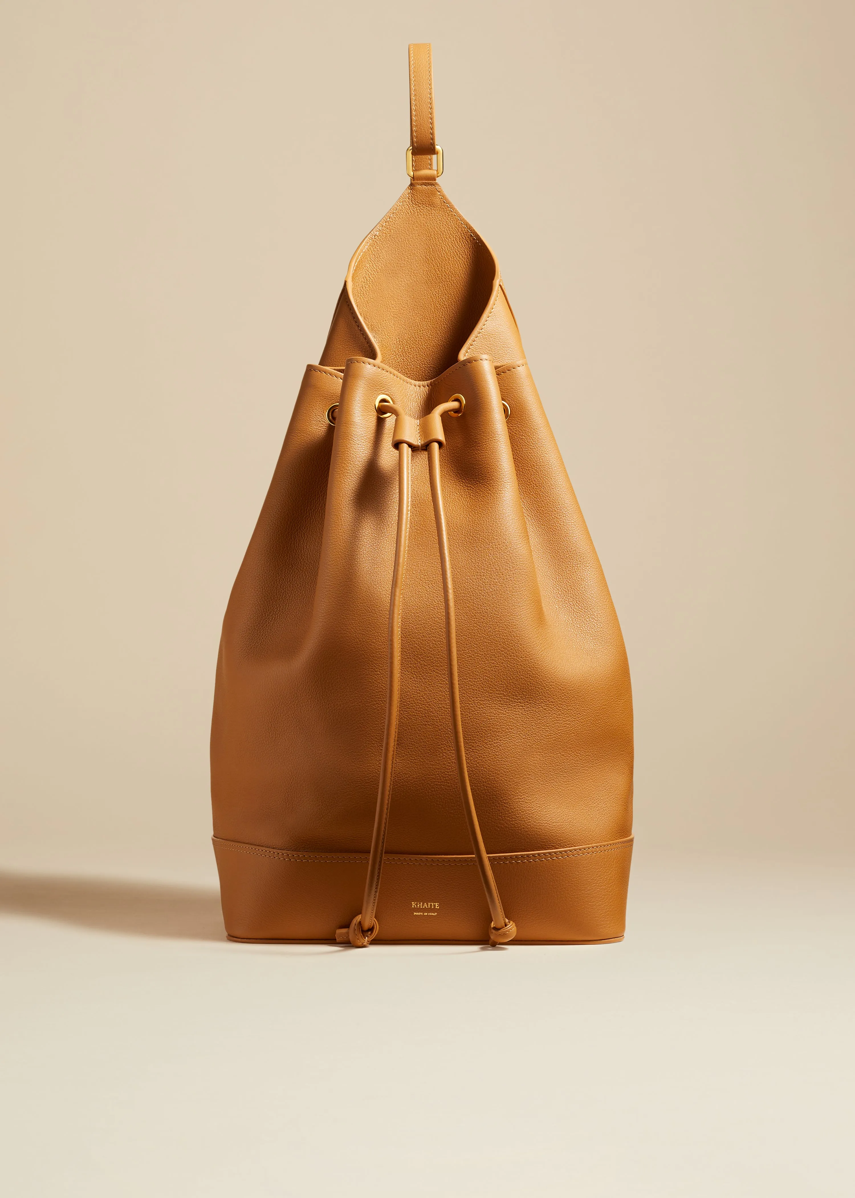 The Medium Greta Backpack in Nougat Pebbled Leather sold by KHAITE