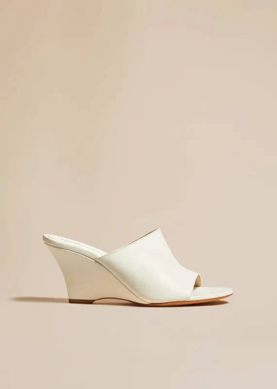 Marion Wedge Sandal in White Leather sold by KHAITE