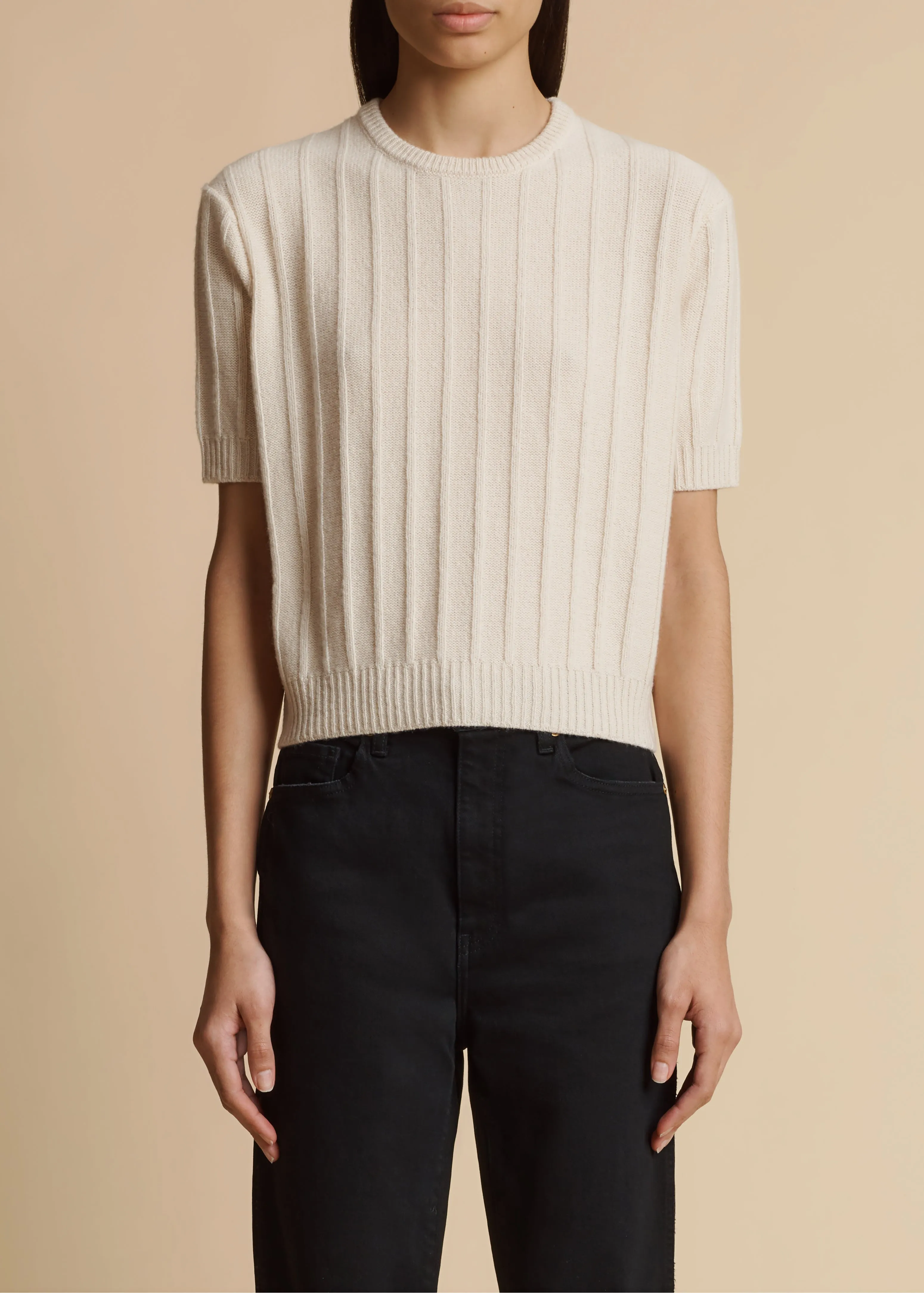 The Esmeralda Sweater in Magnolia sold by KHAITE