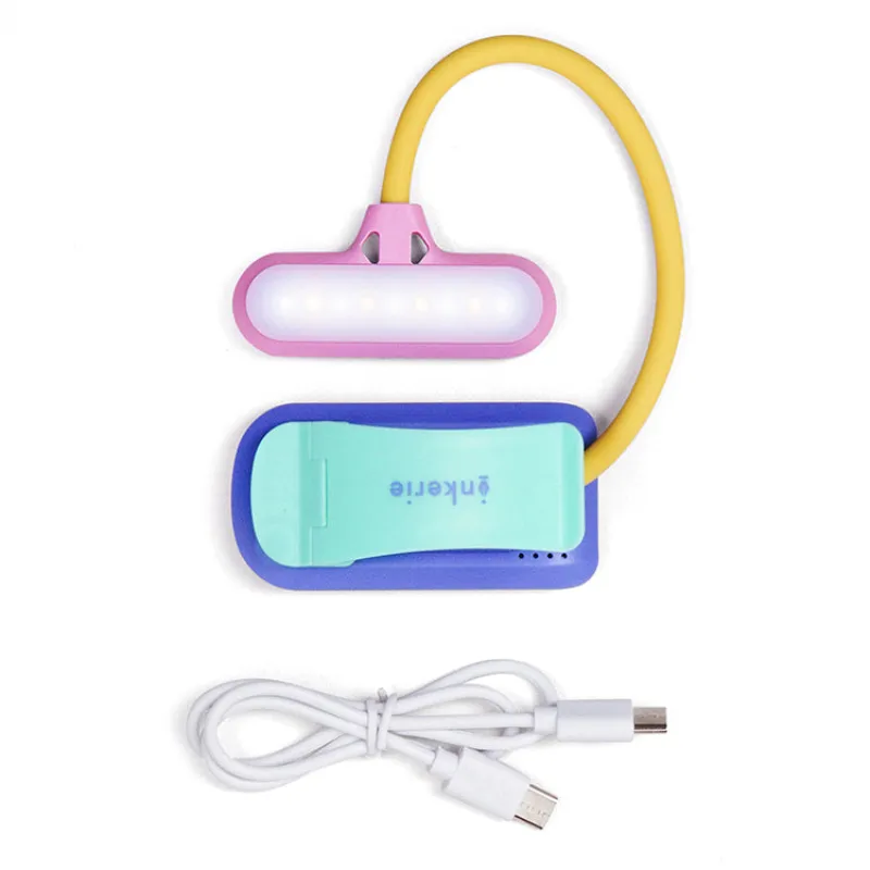 Inkerie Rechargeable LED Book Light sold by Kikkerland