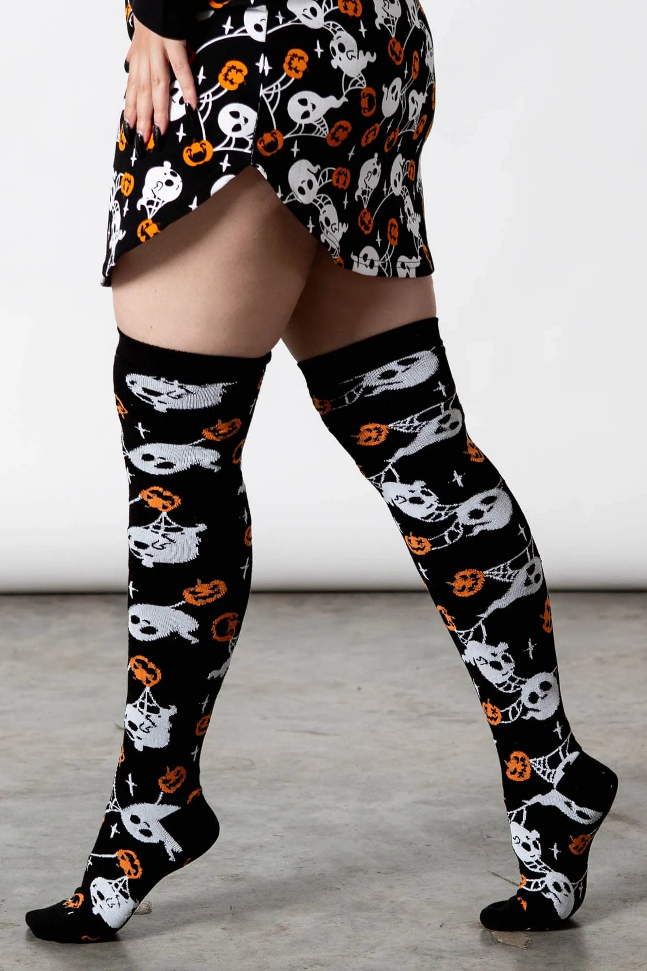 Haunted Pumpkin Knee-High Socks sold by Killstar