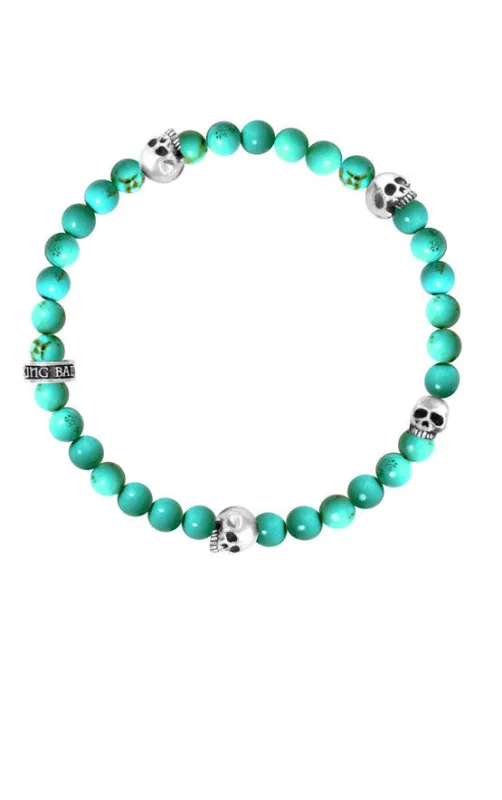 6mm Turquoise Bead Bracelet w/ 4 Skulls sold by King Baby Studio