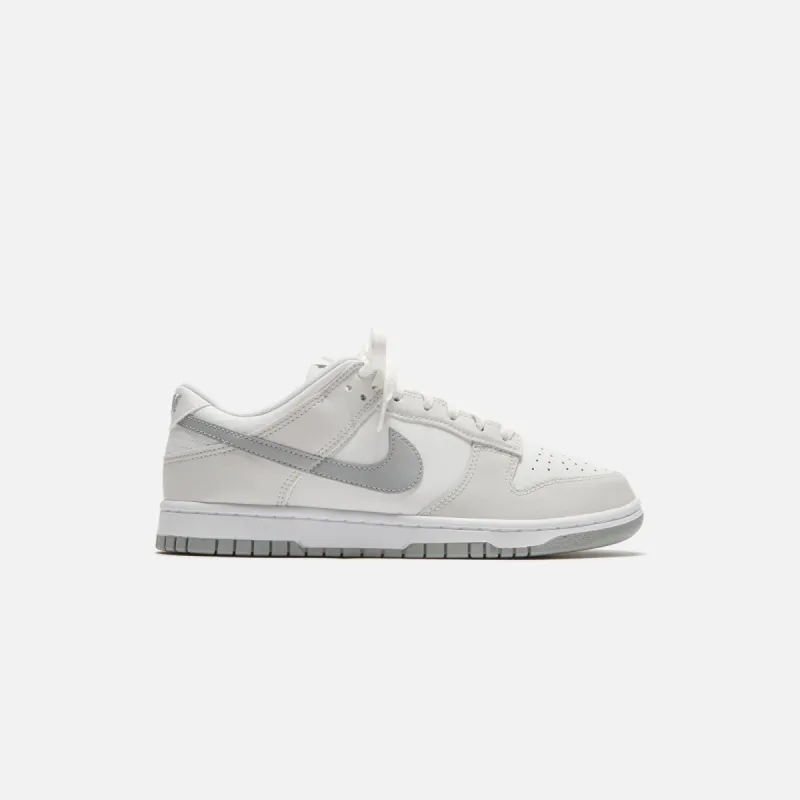 Nike Dunk Low Retro - Summit White / Light Smoke Grey / Platinum sold by Kith