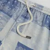 Kith Washed Paisley Active Short - Light Indigo sold by Kith
