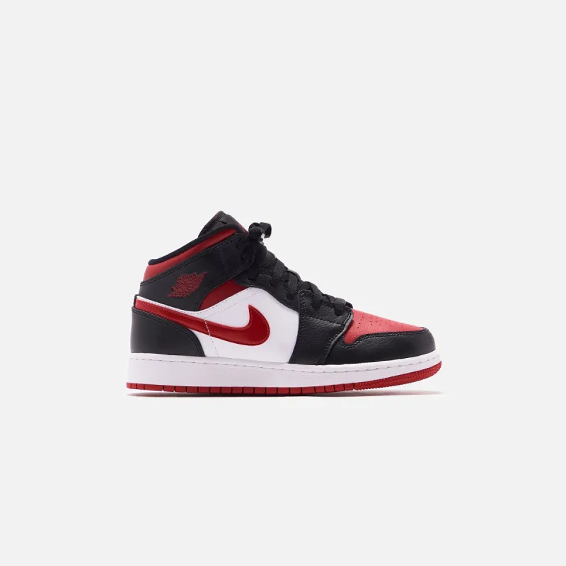 Nike Air Jordan 1 Mid - Black / Fire Red / White sold by Kith