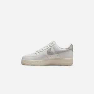 Nike WMNS Air Force 1 `07 - Summit White / Metallic Silver sold by Kith