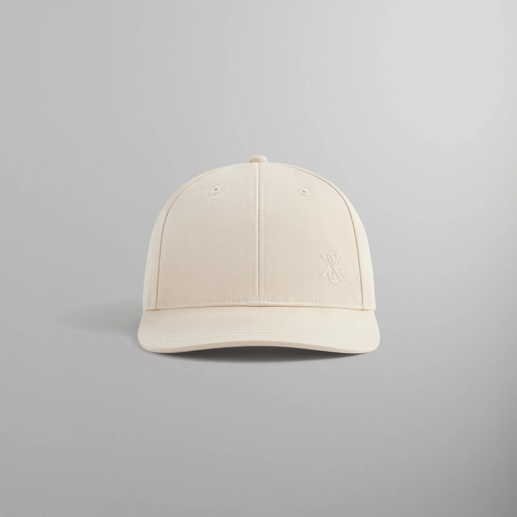 Kith Chain Stitch Crest Aaron Cap - Sandrift sold by Kith