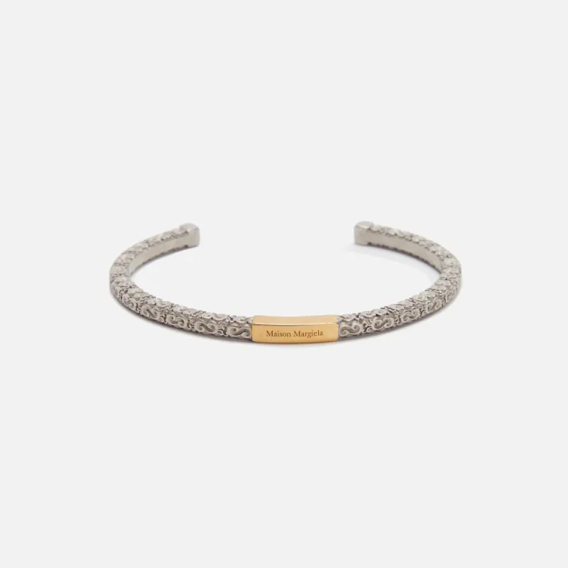 Margiela Intricate Carved Cuff Bracelet - Silver sold by Kith