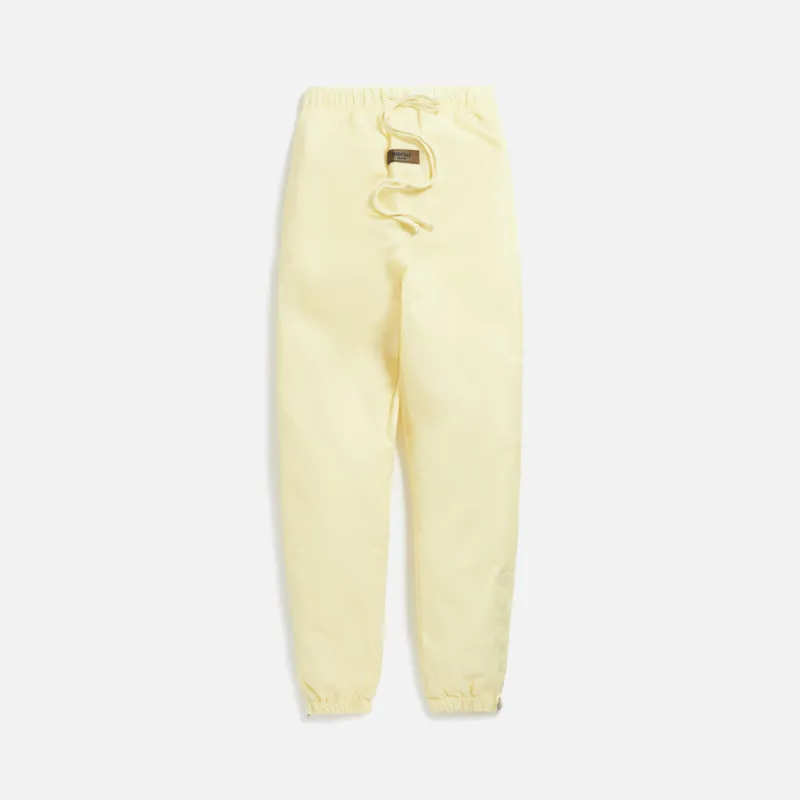 Essentials Nylon Trackpant - Canary sold by Kith