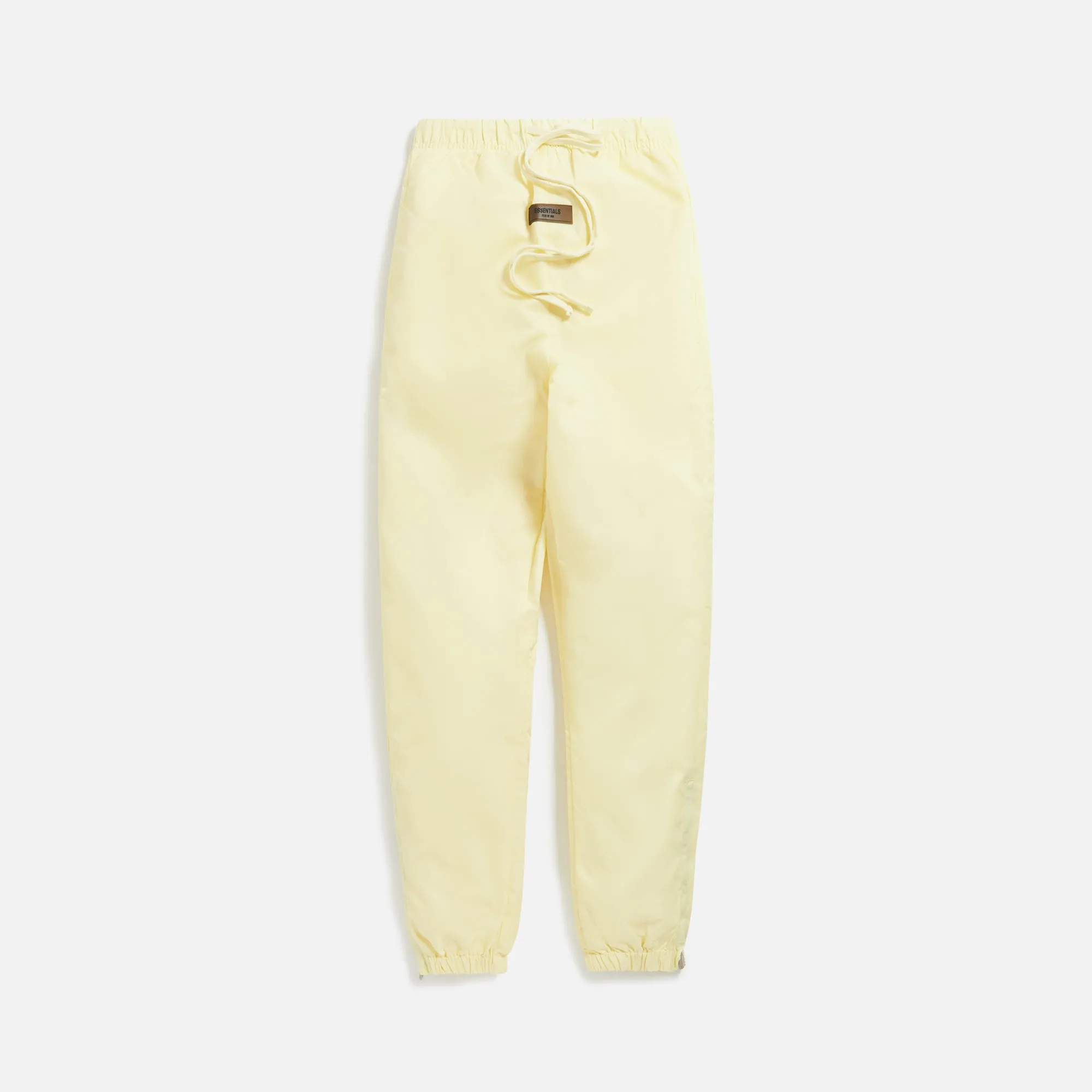 Essentials Nylon Trackpant - Canary sold by Kith
