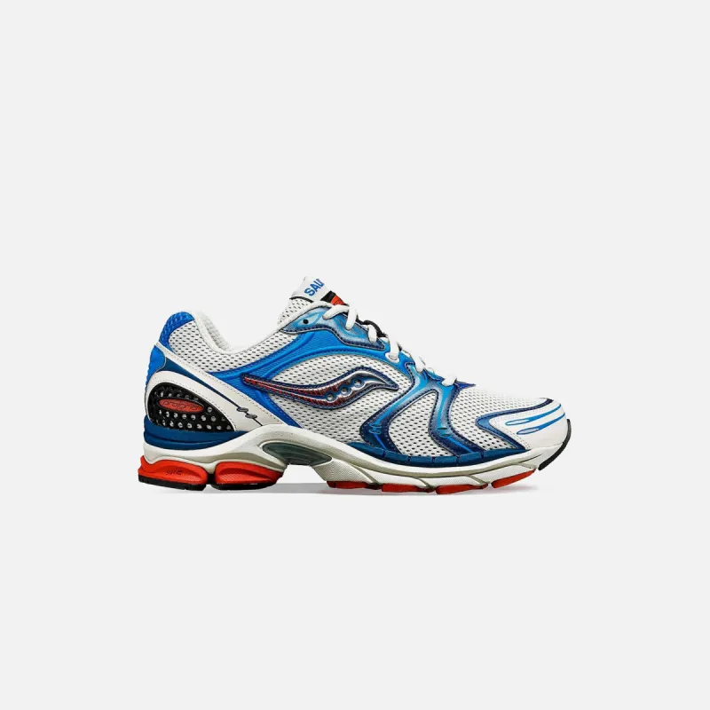 Saucony Progrid Triumph 4 - Grey / Royal / Rust sold by Kith