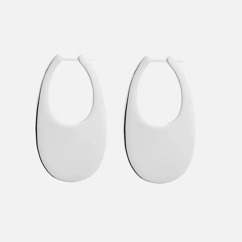 Coperni Large Swipe Earrings - Silver sold by Kith