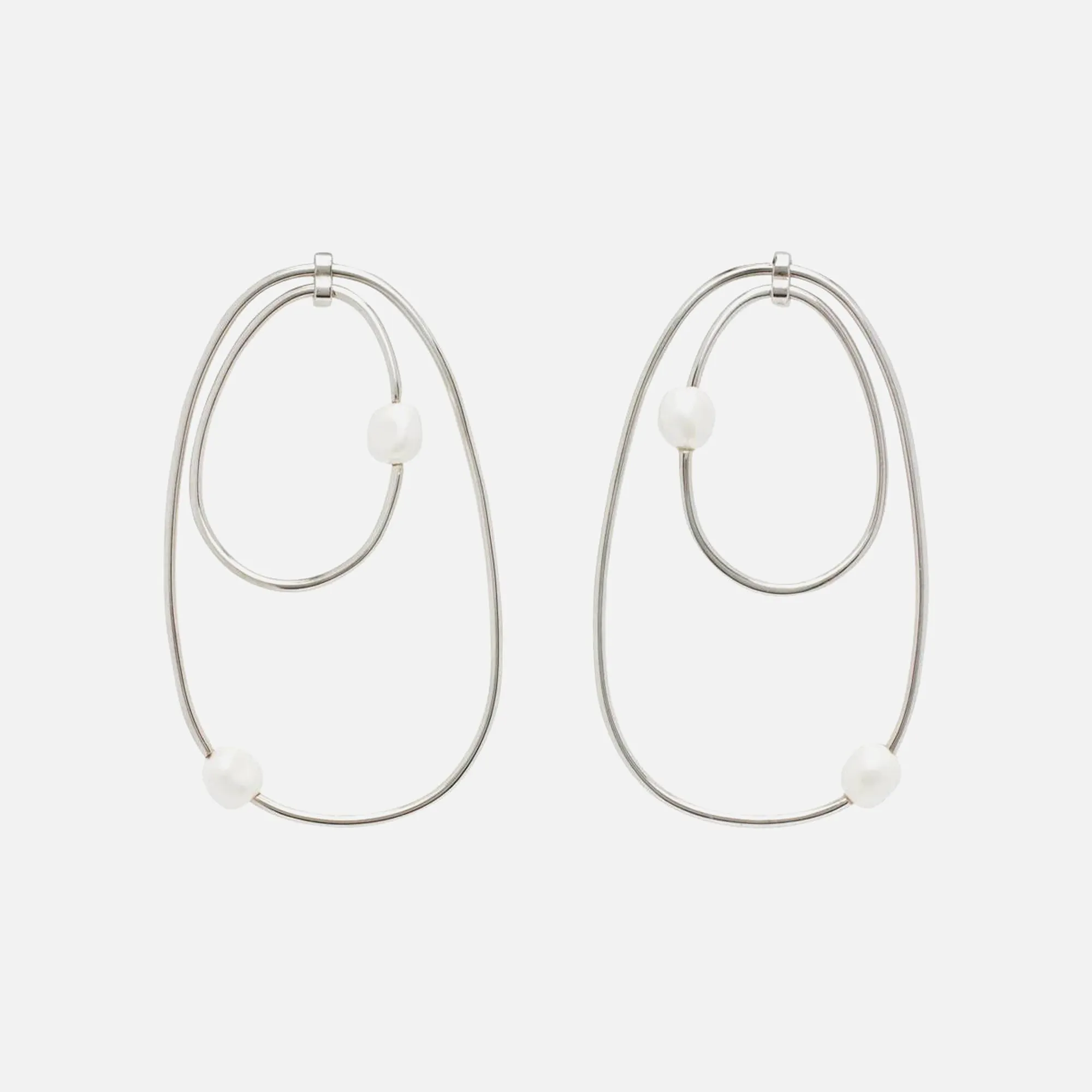 Coperni Orbit Medium Swipe Earrings - Silver sold by Kith