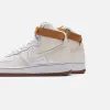 Nike Air Force 1 High `07 LV8 EMB - Phantom / White / Elemental Gold sold by Kith