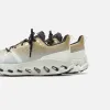 On Running WMNS Cloudsurfer Trail Waterproof - Safari / Mineral sold by Kith