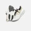 On Running WMNS Cloudsurfer Trail Waterproof - Safari / Mineral sold by Kith