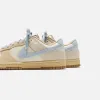 Nike Dunk Low - Coconut Milk / Sanddrift / Hemp / Light Armory Blue sold by Kith