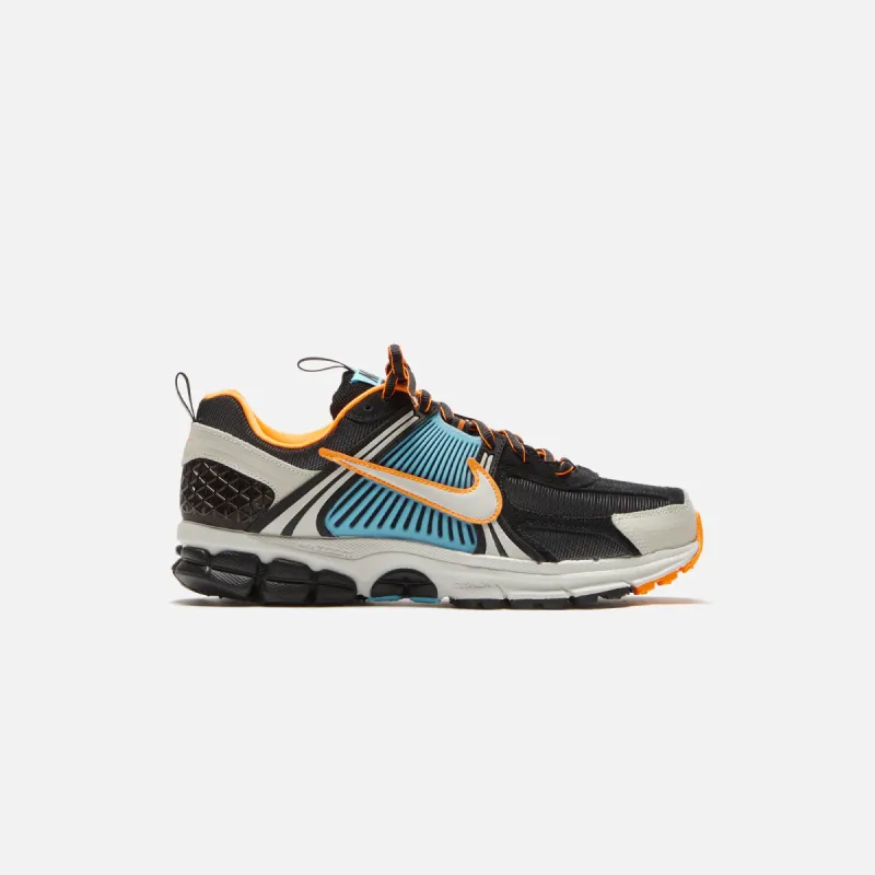 Nike WMNS Zoom Vomero 5 - Black / Light Bone / Blue Gaze / Total Orange sold by Kith