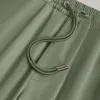 &Kin Washed Satin Kelvin Parachute Pant - Bay Breeze sold by Kith