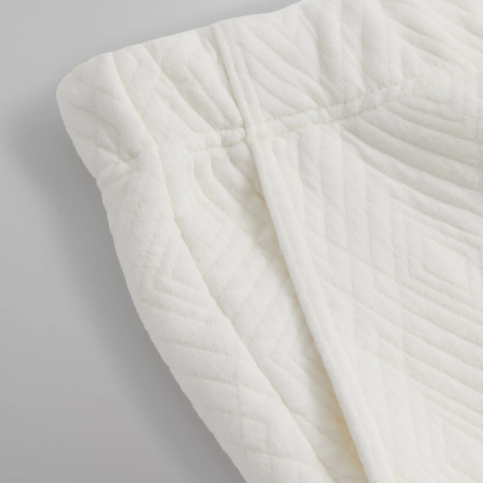 Kith Quilted Interlock Elmhurst Pant - Sandrift sold by Kith product image thumbnail 4