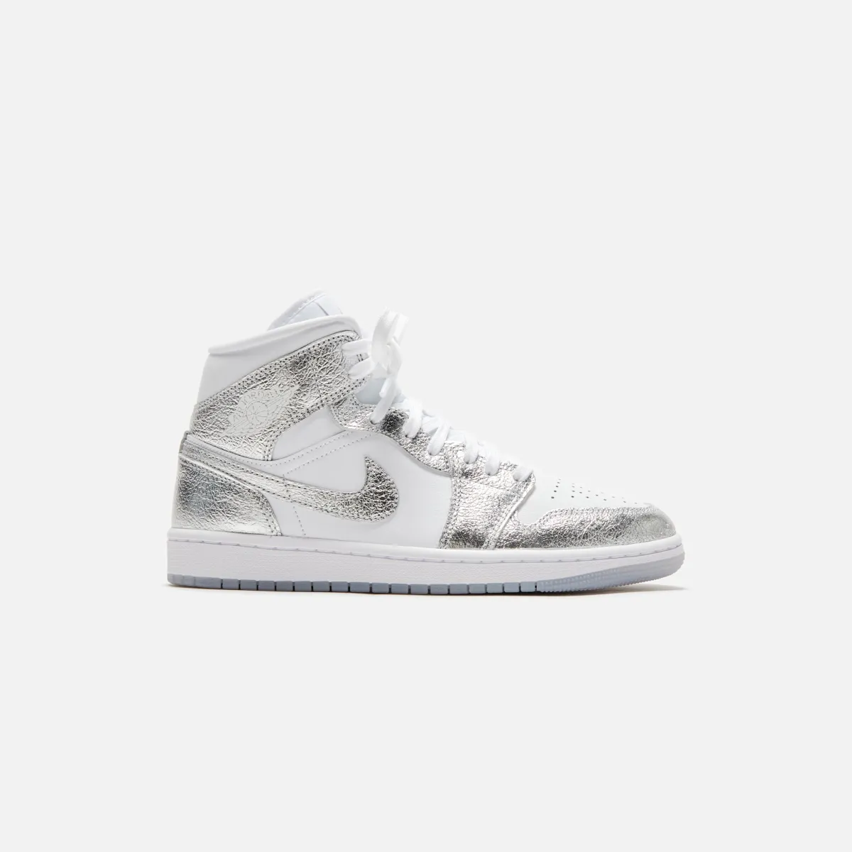 Jordan WMNS Air Jordan 1 Mid SE - White / Metallic Silver sold by Kith