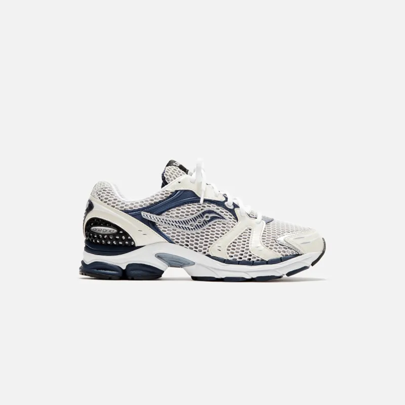 Saucony Progrid Triumph 4 - White / Navy sold by Kith