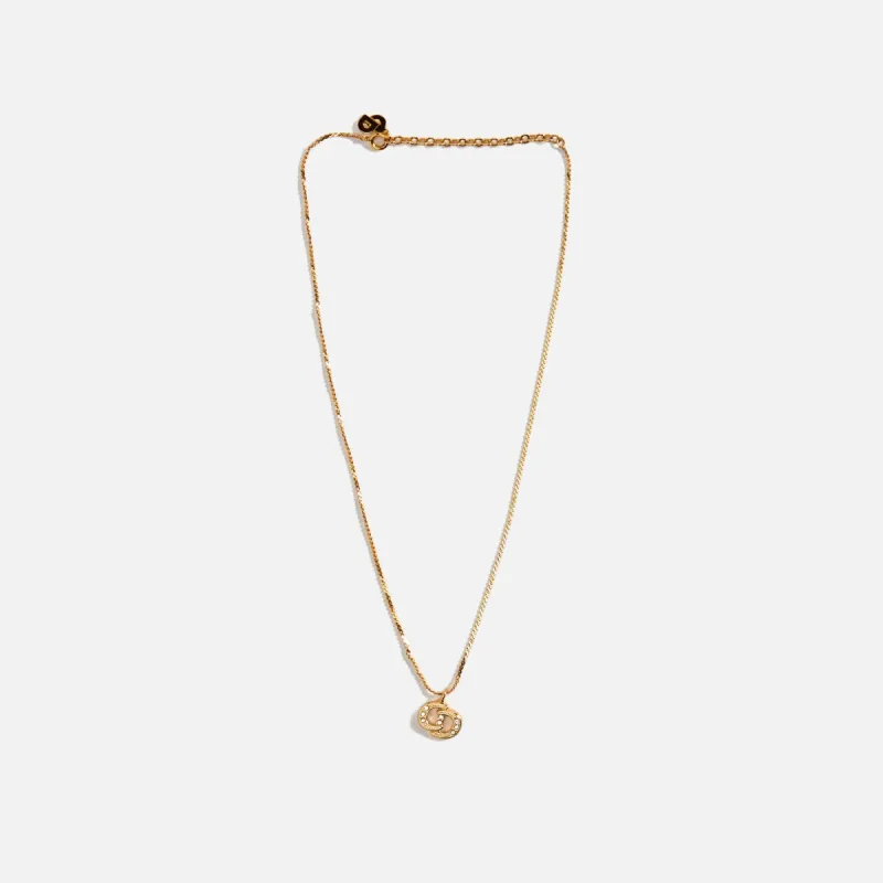 WGACA Dior Crystal Round Oval Logo Necklace - Gold sold by Kith