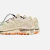 Salomon XT-4 OG Aurora Borealis - Shortbread / Bird Of Paradis / Black sold by Kith