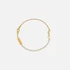 Saint Laurent Monogram Bracelet with Crystals - Yellow Gold sold by Kith