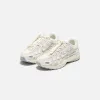 Nike WMNS P-6000 - Light Bone / Platinum Violet / Cement Grey sold by Kith