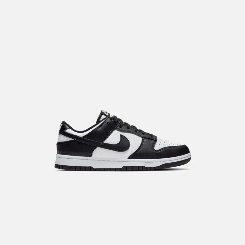 Nike WMNS Dunk Low - White / Black sold by Kith