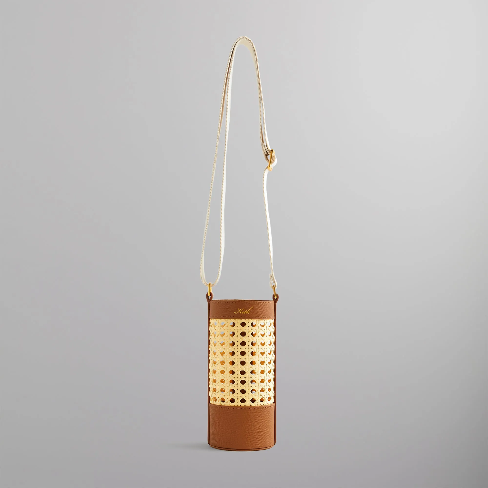 Kith Raffia Bottle Holder - Arch sold by Kith