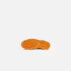 Nike Air Jordan 1 Mid Se V2 - Black / Vivid Orange Cardina sold by Kith