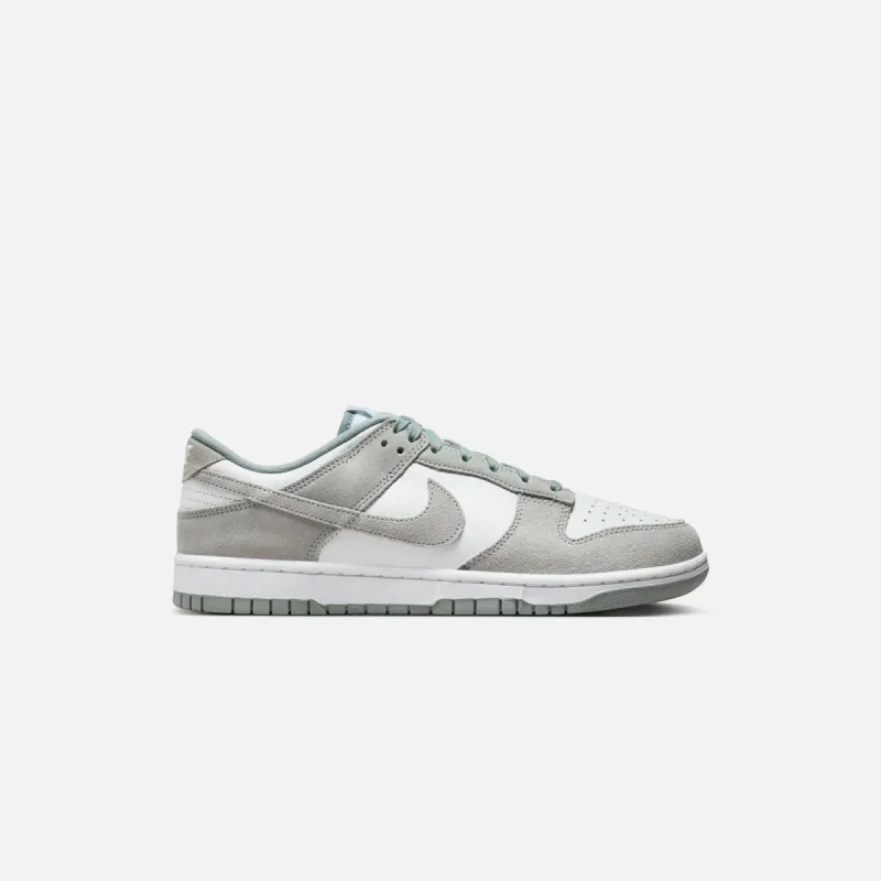 Nike Dunk Low Retro SE - White / Light Pumice sold by Kith