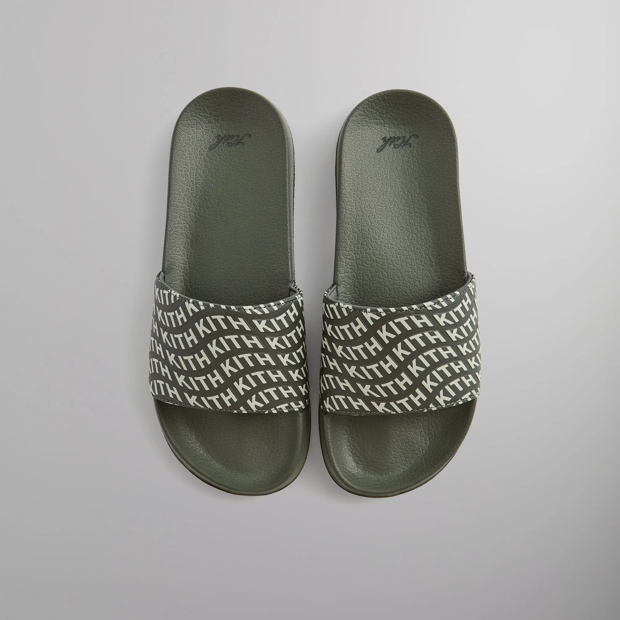 Kith Wave Monogram Slide - Tinge sold by Kith