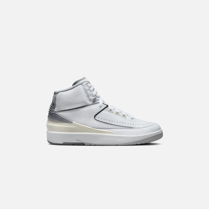 Nike Air Jordan 2 Retro - White / Cement Grey / Sail / Black sold by Kith
